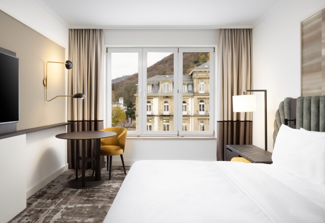 A room at the Hilton Heidelberg in Germany with a view of the Heidelberg Old Town.