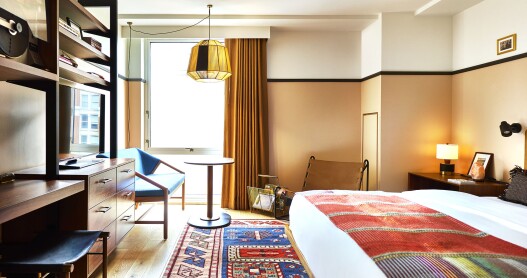 The guest rooms at Eaton DC were designed to impart a down-to-earth vibe with midcentury influences.