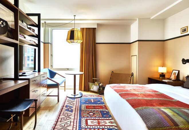 The guest rooms at Eaton DC were designed to impart a down-to-earth vibe with midcentury influences.