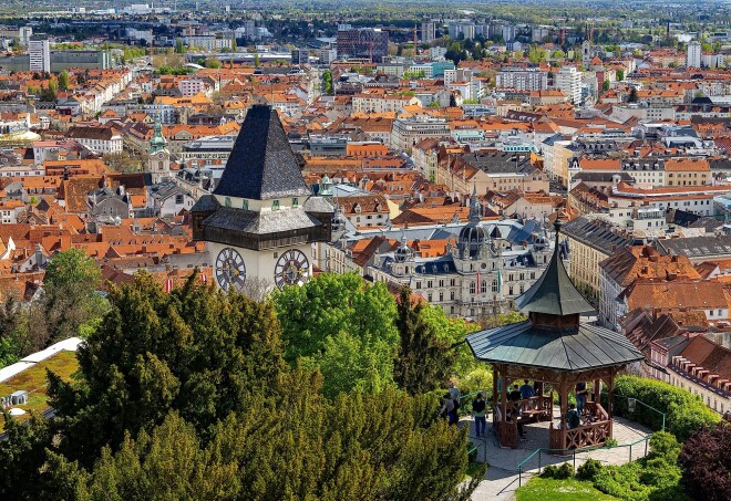 Graz’s iconic clock tower hovers above the city, where from high above the past blends into the contemporary.